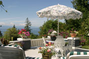 Private Deck viewing Georgia Strait with Vancouver Island in the distance. -- photo by Ingeborg Suzanne